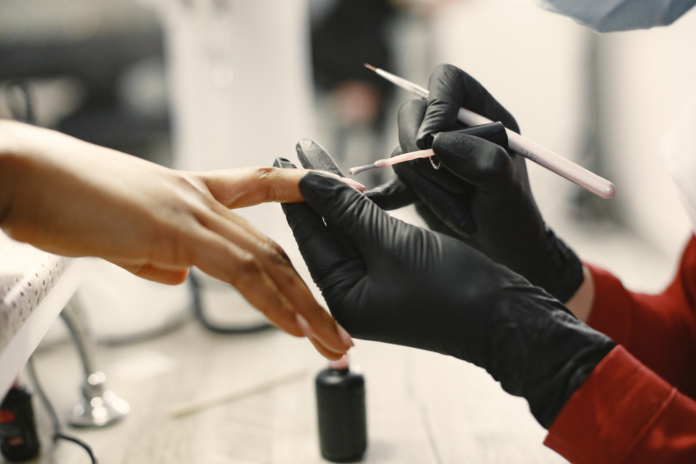 master-manicure-african-woman-beauty-salon